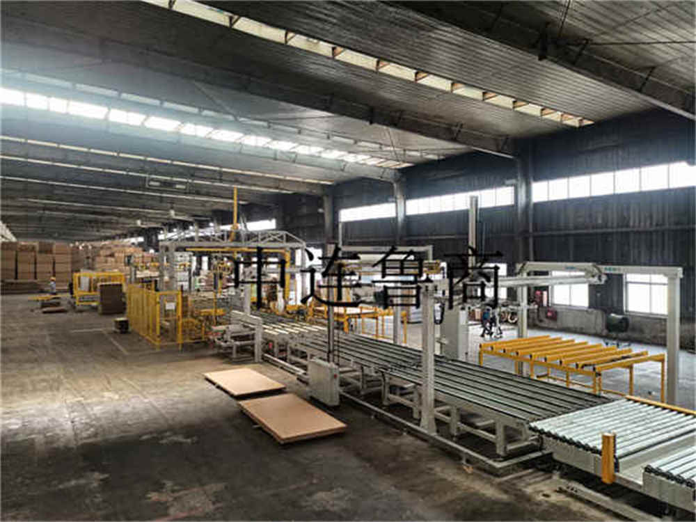 Sistema de embalaje inteligente para tableros de madera hechos por el hombre