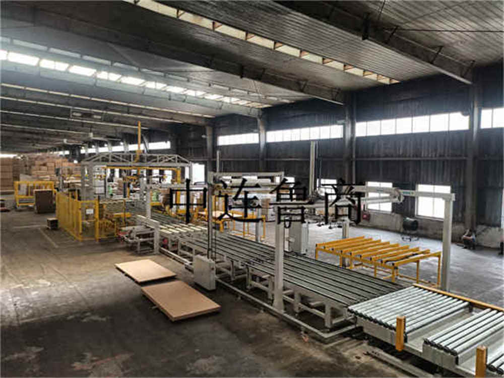 Sistema de embalaje inteligente para tableros de madera hechos por el hombre