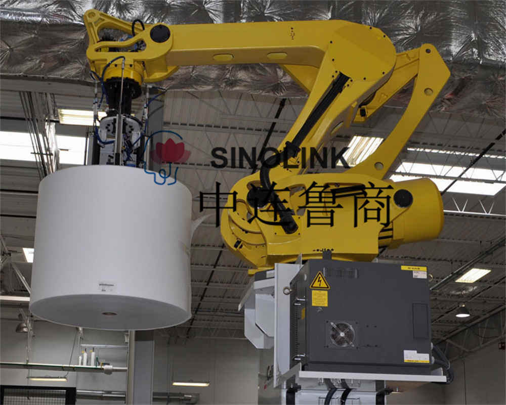 Sistema de embalaje y transporte automático de tela no tejida